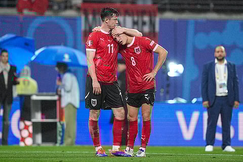 Michael Gregoritsch comforts Alexander Prass